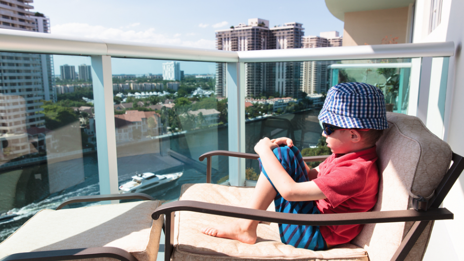 child_on_condo_balcony_shutterstock