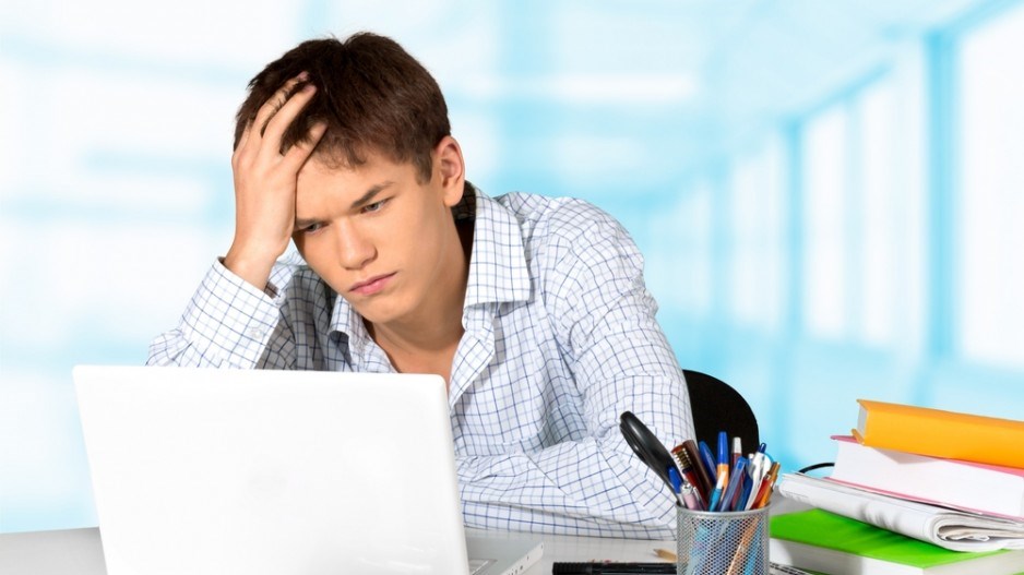 concerned_young_worker_shutterstock