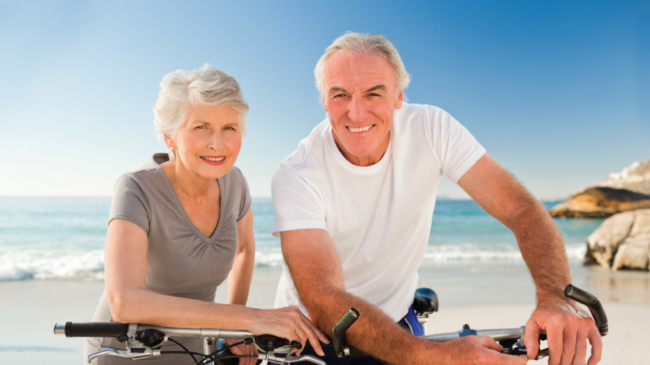 retiredcouplecyclingshutterstock