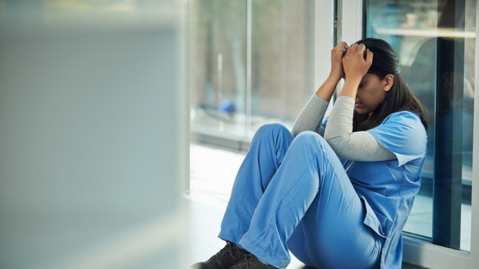 stressed-health-care-worker-ajwatt-e-plus-getty