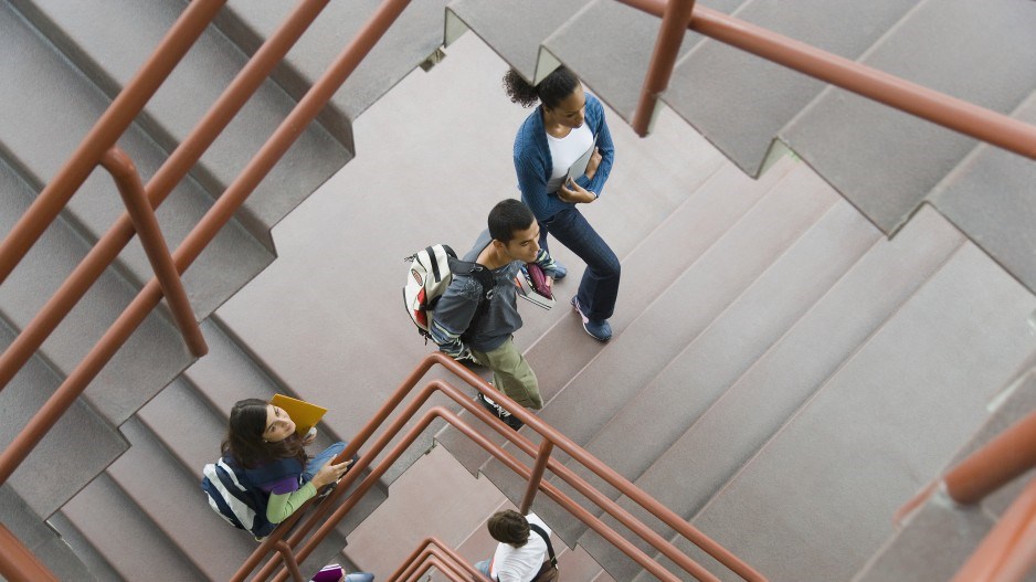 studentswalkingonstaircasecommercialeye-theimagebank-gettyimages