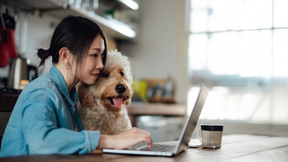 womandogsearchingoncomputer-reading-credit-oscarwong-moment-gettyimages