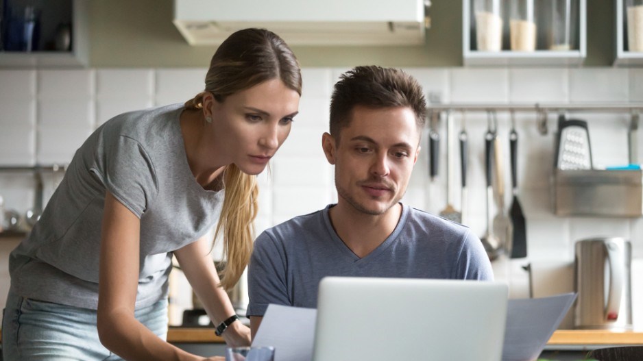 young-couple-finances-shutterstock