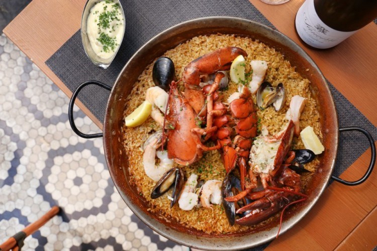 Coast has a prix fixe menu for Valentine's Day that includes paella for two. Coast