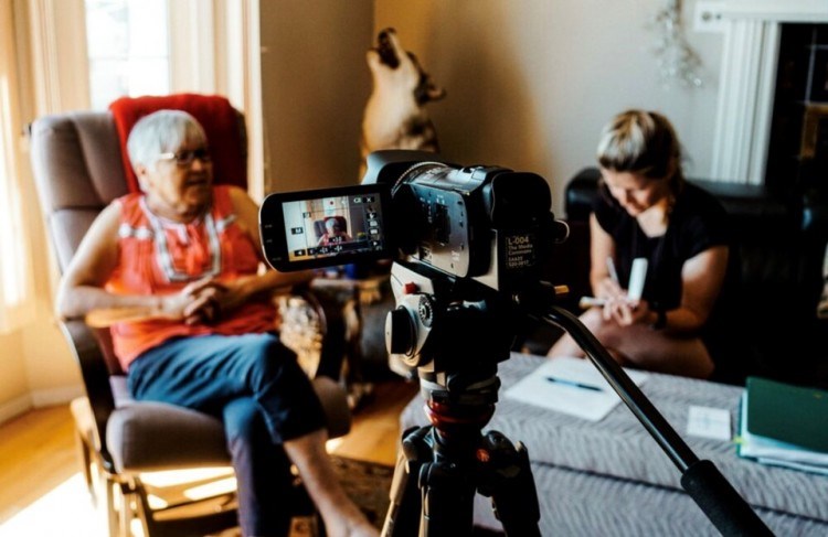 Andrea Reid interviews a matriarch in Ging̱olx, B.C. Mikayla Wujec