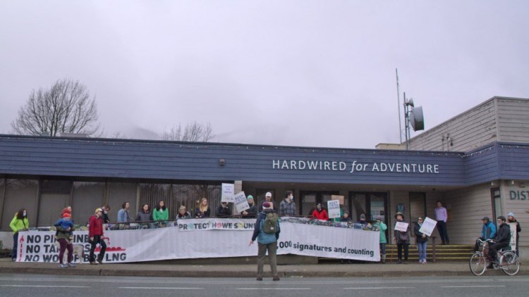 Protesters outside muni hall on Tuesday, when Woodfibre LNG and FortisBC representatives were presenting. . Paul Watt