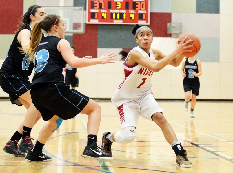 Burnaby's Zion Corrales Nelson, shown above driving the offence for the St. Thomas More Collegiate Knights, was named Sport BC's Female High School Athlete of the Year on Wednesday.