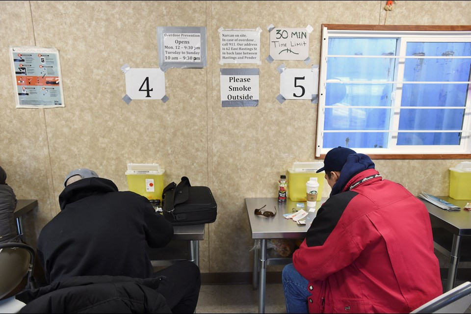 An eight-day stretch in Vancouver saw more people die of a drug overdose in areas outside the Downtown Eastside, which has been the epicentre of the drug death crisis in the province. Pictured are drug users inside an injection room this week in the Downtown Eastside. Photo Dan Toulgoet