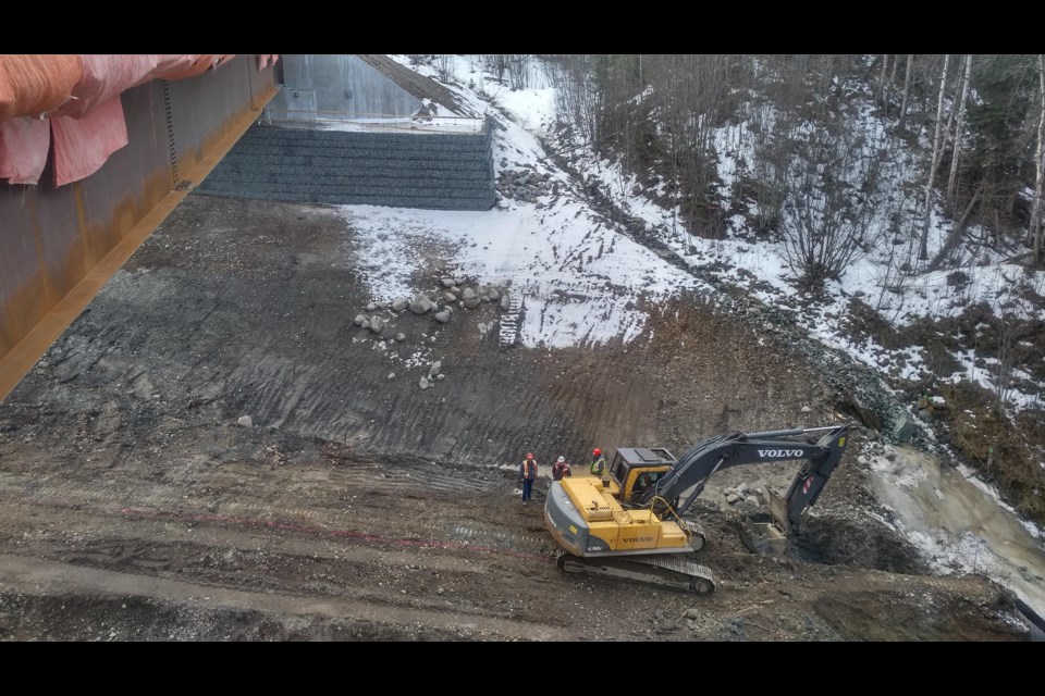 A view from the new bridge at Haggith Creek of an excavator uncovering the culvert down below.
City of Prince George handout photo