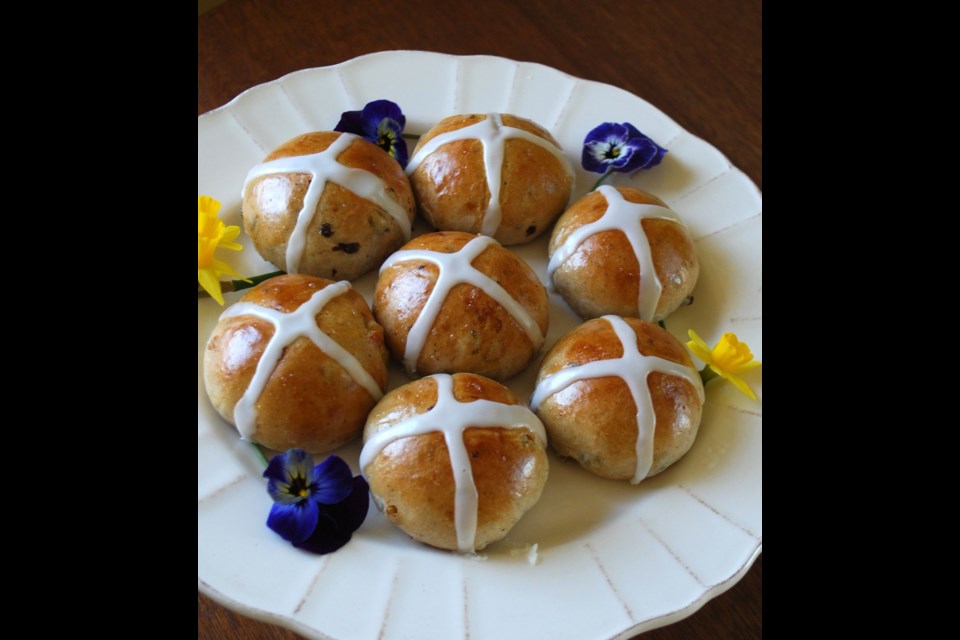 There's an irresistible mix of sweet, spicy and fruity flavours in these festive hot cross buns.