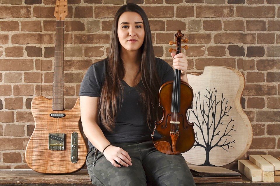 Vancouver luthier Meredith Coloma has built guitars and other instruments for musicians around the world.