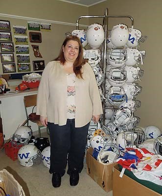 Artist Marina Georgiadis checks out the field house at Elm Park in Kerrisdale during a tour Wednesday afternoon.