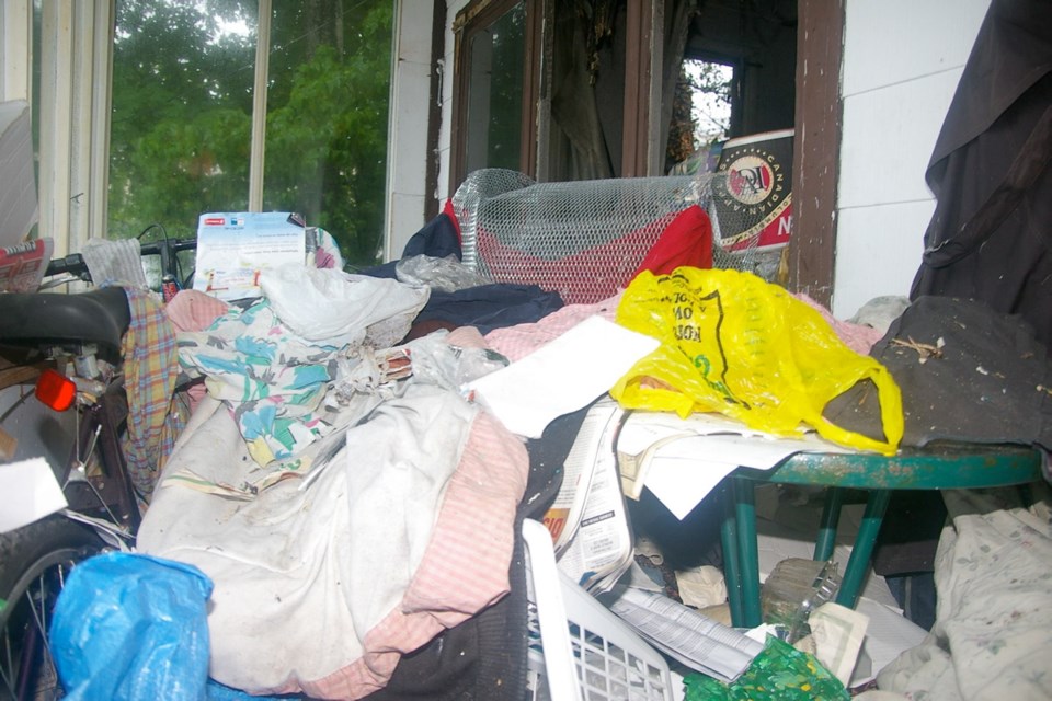 A scene firefighters encountered after battling a hoarding-related fire elsewhere in a Nanaimo home.