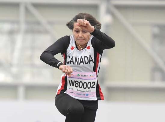 West Vancouver’s Christa Bortignon leaps to a new age-group world record in triple jump at the Canadian Masters Indoor Championships. photo Rob Jerome
