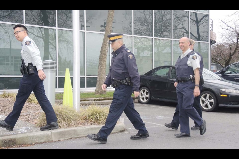 Richmond Mounties were spotted outside their No. 5 Road detachment on Monday with something missing from their uniforms. The officers’ pants were minus the traditional yellow stripe, as they made a public show of solidarity for a fellow member on the Sunshine Coast, who is protesting a national pay increase, which many Mounties say is insufficient. Full story on page 3.