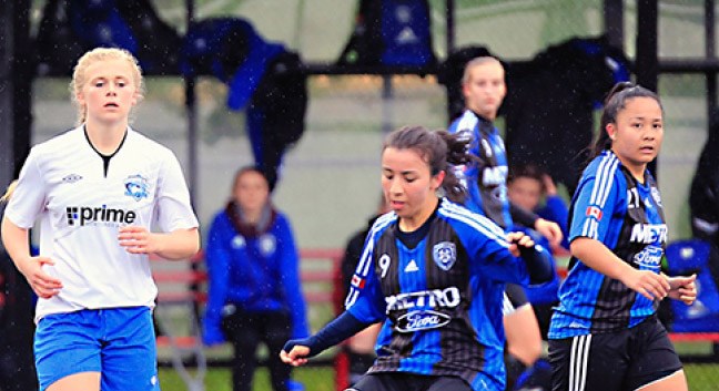 Erica Reis carries the ball for the Coquitlam Metro-Ford SC under-18 team during a 4-1 win over the Vancouver Island Wave at Town Centre Park last week. The club is currently in fourth place in the BC Soccer Premier League standings with a 2-1 record.