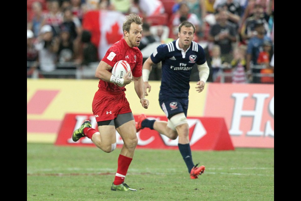 West Vancouver’s Harry Jones heads for the end zone during Canada’s 26-19 win over the United States en route to the team’s first ever World Rugby Sevens Series title Sunday in Singapore. photo Martin Seras Lima