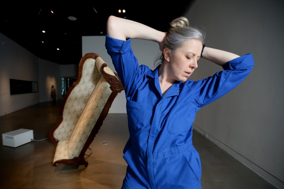 Evann Siebens rehearses for her Please Don't Sit On the Furniture performance. She's performing in the New Media Gallery on Saturday.