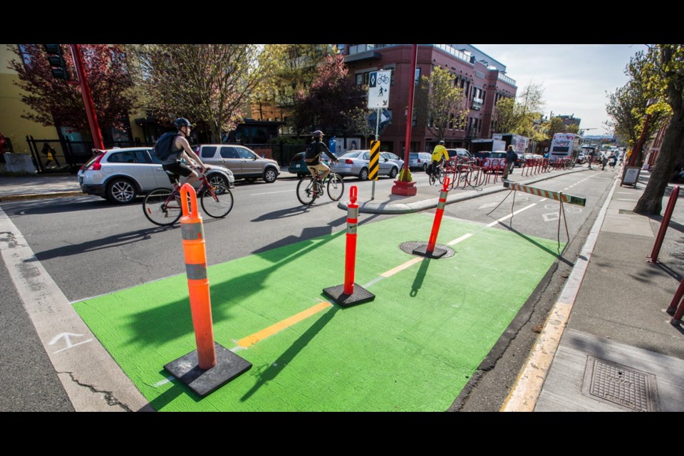 Green paint sets off new two-way bike lanes at Pandora Avenue and Government Street.