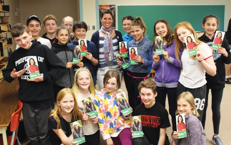 Students at Cedar Grove Elementary had some informed and intriguing questions for candidates who visited their school during the lead-up to election day. Grade 6 and 7 students at the Gibsons school studied the electoral process in class and got familiar with party platforms and major community issues before inviting candidates to come speak. “One student asked Kim Darwin [of the Green Party] how come she was using plastic signs if she was representing a party that was all about the environment,” said Cedar Grove principal Barry Krangle. “Kim agreed and confessed she felt bad using plastic, ‘But you know what,’ she challenged the student, ‘after this election, I’m going to collect all the signs and write re in front of elect and recycle all of them for the next election.’” Krangle said Liberal candidate Mathew Wilson complimented the students on their interest and involvement in the election and challenged them to always listen to more than one side of a story. NDP incumbent Nicholas Simons said some of the best questions he heard during the campaign “about Site C, seniors care, ferries and even #IamLinda” came from the young students. Cedar Grove students will join students from all over B.C. and vote online on May 9 as part of the Student Vote Day in partnership with Elections BC.