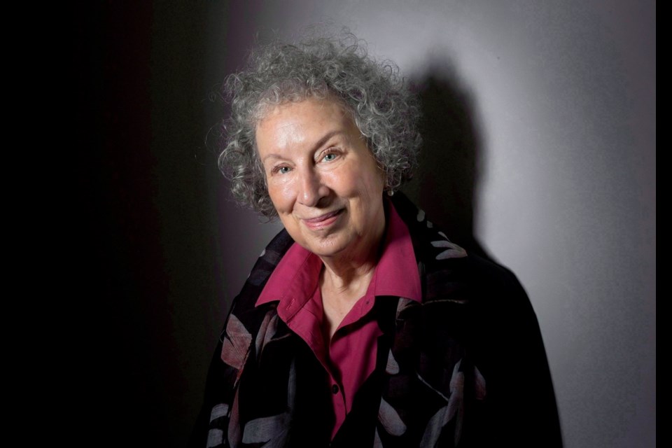 FILE - In this June 9, 2015 file photo, author Margaret Atwood poses to promote her novel, "The Heart Goes Last" in Toronto. Atwood, marvels at how her 1985 novel,