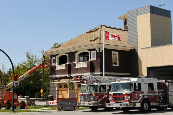 The beige stucco that once dominated the corner of East 22nd avenue and
Nootka is gone. Now the nearly 100-year-old Firehall No. 15 is clad with brown cedar siding and creamy white trim while massive fir doors mark the twin bays where horse-drawn fire steam engines once charged.