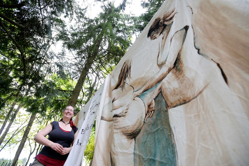 Artist Emily van Lidth de Jeude with her work at Deer Lake Gallery. The show has works installed both indoors and outdoors at the gallery.