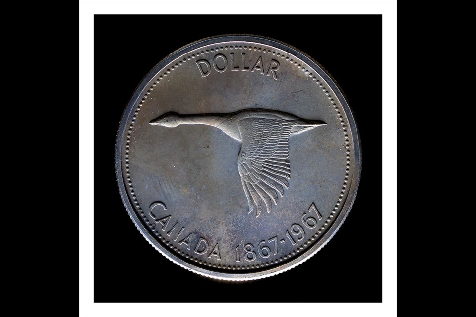 This coin was designed by famous Canadian painter, Alex Colville, and the photograph is by Winnipeg photographer, William Eakin.
