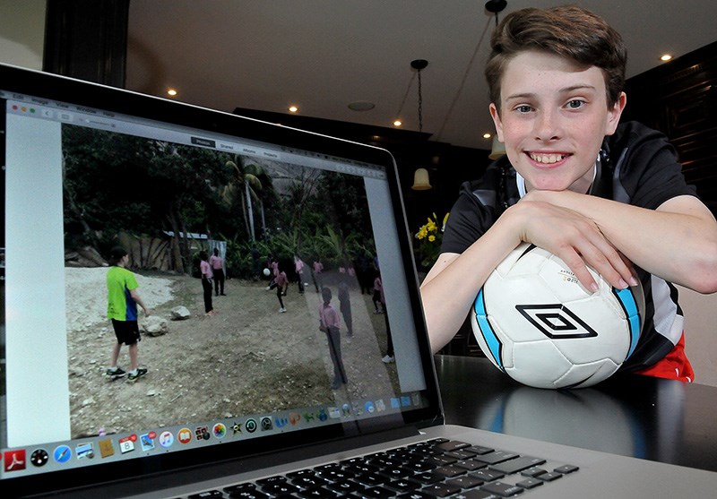 MARIO BARTEL/THE TRI-CITY NEWS Ethan Hite, 13, spent his Spring break holiday traveling to Haiti with 100 pounds of soccer equipment donated by members of Port Moody team that he delivered to a school in Montrouis.