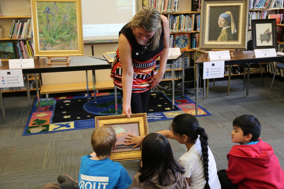 Grade 1 students at Lord Selkirk were invited to see and feel 3D replicas of such paintings as Tom Thomson’s “Sunset Sky.” Photo Ivy He