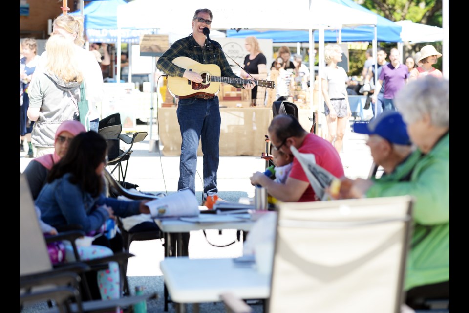 Jeff Neufeld performs at the Burnaby Artisan Farmers' Market on Saturday, May 20.