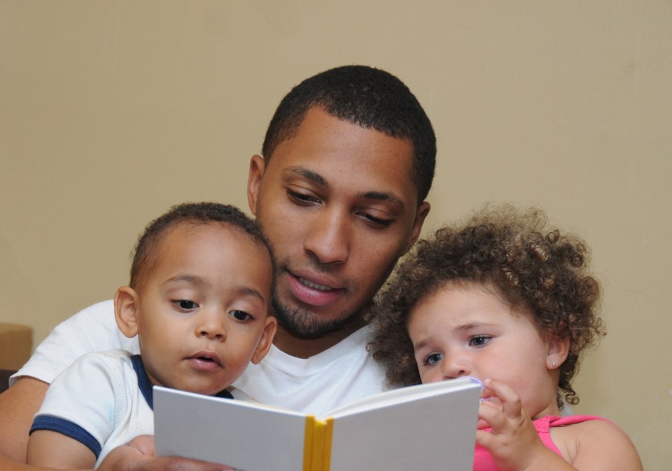 reading with dad, istock