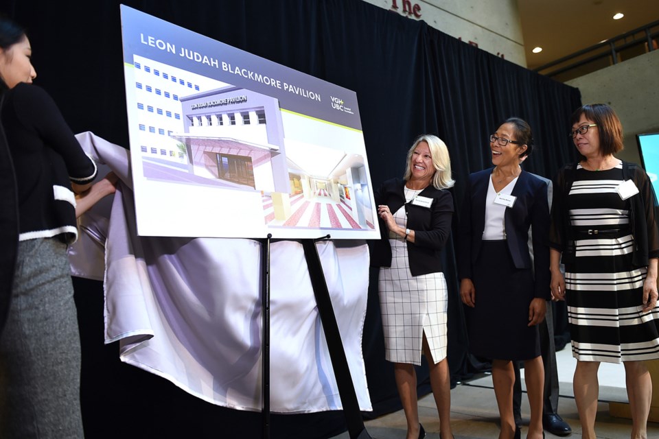 Bonnie Tse, Nicola Brailsford, Marlita Minor and Sybil Wai of the Leon Judah Blackmore Foundation unveil a drawing of the newly renamed building at VGH.
