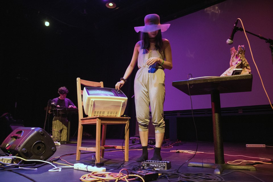 Artist Alanna Ho on Granville Island’s Revue Stage during her 15-minute Game of Drones segment. Photo Rebecca Blissett