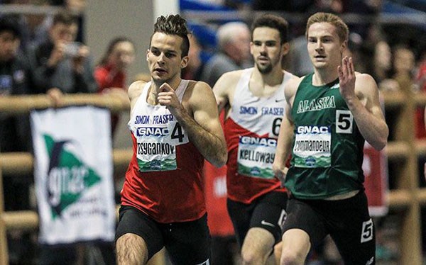SFU’s Vladislav Tsygankov, at left, made All-American status in the 400-metre hurdles, despite having only ran it three times before.