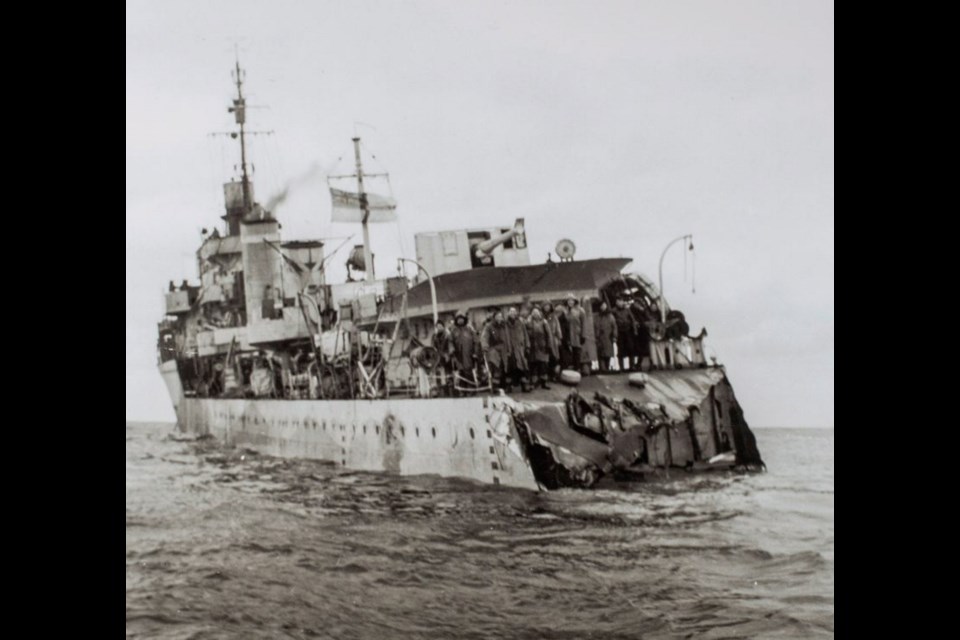 Archival photo of HMCS Saguenay showing damage from being rammed by a merchant ship, pictured in Halifax.