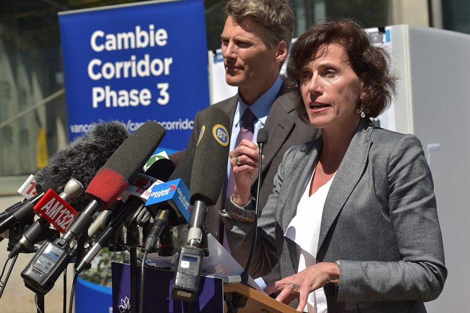 Mayor Gregor Robertson and Susan Haid, the city’s assistant director of planning, outlined details of the draft Cambie Corridor phase three plan at a press conference outside Oakridge Centre Monday. Photo Dan Toulgoet