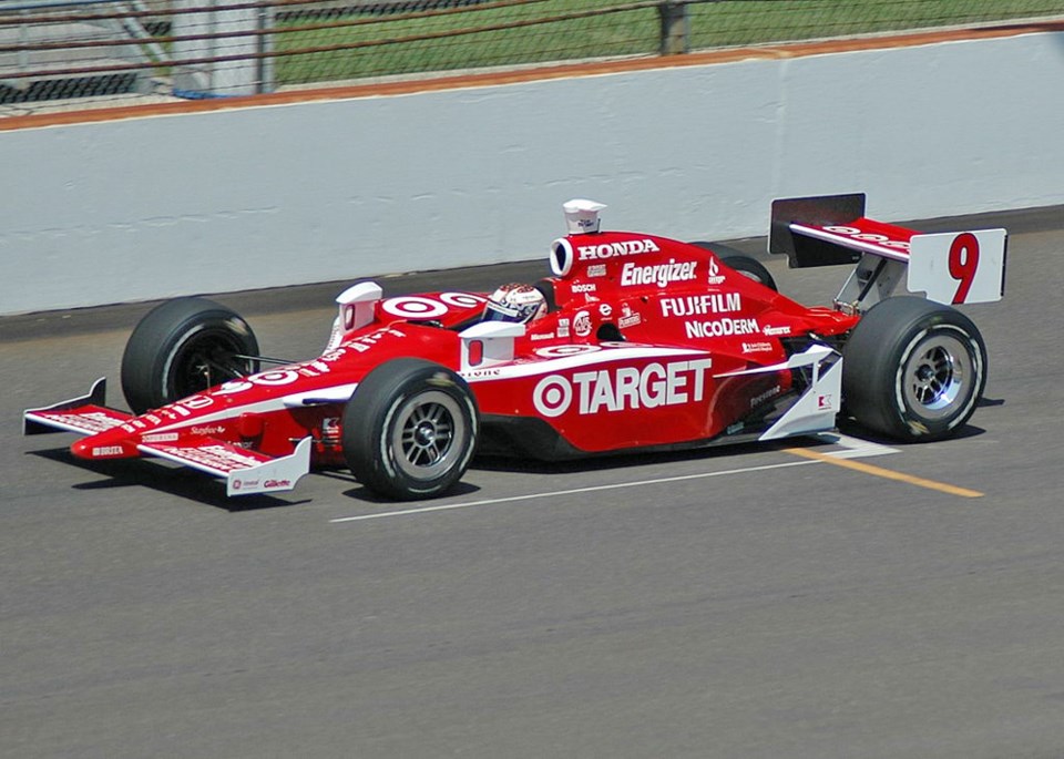 Scott Dixon doesn’t have to contend with gun-wielding robbers when he’s on the track. photo Carey Ak