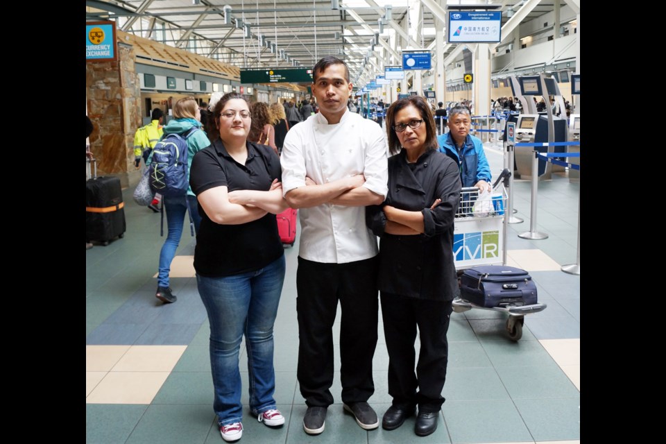 Some unionized employees at YVR (above, left to right: Natasha Movaseghi, Kenny Carandang and Fipe Wong), are asking the airport authority to mandate a higher mandatory minimum wage and job retention policies for all contracted employees. Photo by Graeme Wood/Richmond News