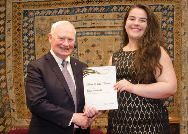 Ladner’s Hailea Caldwell and Natalie Burt-Carrol (pictured) of Tsawwassen were presented with the Duke of Edinburgh’s International Gold Achievement Award by Governor General David Johnston earlier this month. The award program challenges youth to achieve personal goals through community volunteerism, developing and pursuing skills in an area of passion, and planning, training for and completing an adventurous journey exploring the outdoors. Participants at the gold level must also complete a section that involves staying and working away from home for at least five days.