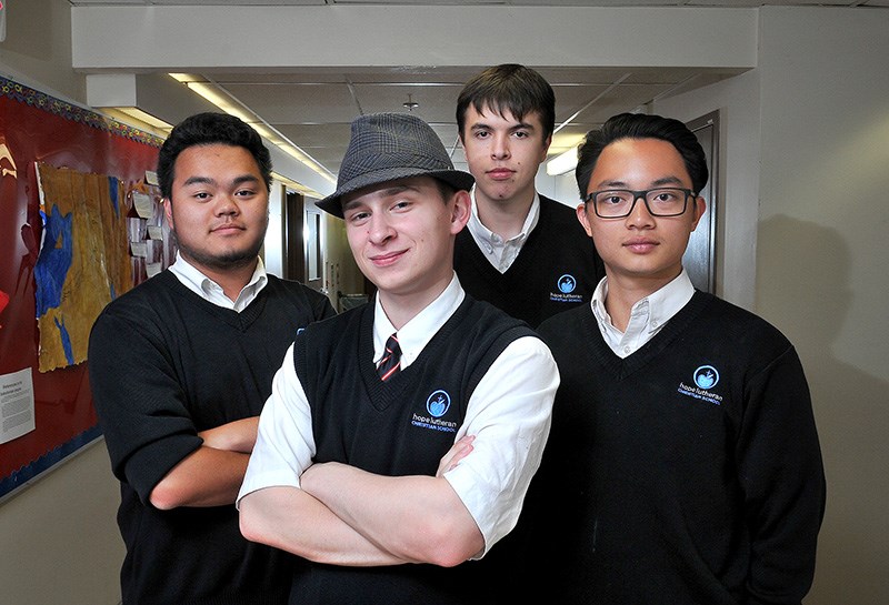 MARIO BARTEL/THE TRI-CITY NEWS
Hope Lutheran Christian School's 2017 graduating class is all of four students: L-R Dana Yang, Daniel Bradley, Taylor Audette and Gary Huang. They're the first to graduate from the Port Coquitlam private school's new high school and middle school campus in Pitt Meadows.