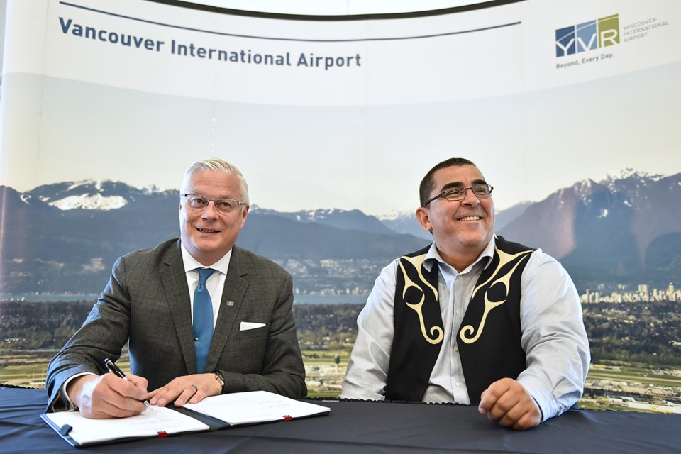 Craig Richmond, president and CEO of the Vancouver Airport Authority, signed a 30-year “sustainability and friendship” agreement Wednesday with Musqueam Indian Band Chief Wayne Sparrow. Photo Dan Toulgoet