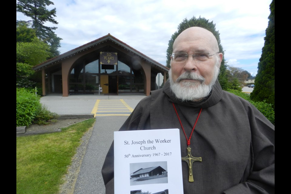 Fr. David Poirier outside St. Joseph the Worker Church, which celebrates its 50th anniversary in 2017 with a series of events starting Friday. Photo by Philip Raphael/Richmond News.