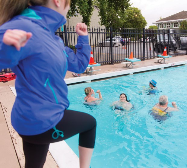 Rachel Hansen leads an aqua fit class at the Ladner Outdoor Pool, which opened for the season last Monday.