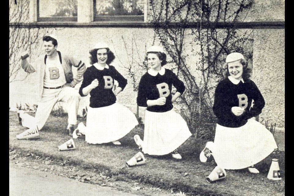 Burnaby South High School cheerleaders Pete Rae, Pam Dreaper, Ethelmae Hanson and Helen Silvan cheer on the home team in 1947.