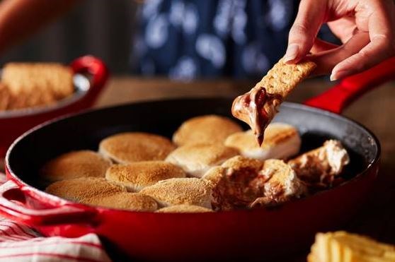 You don't need a campfire to make this s'mores dip, which you can enjoy with Graham crackers or chips and pretzels.