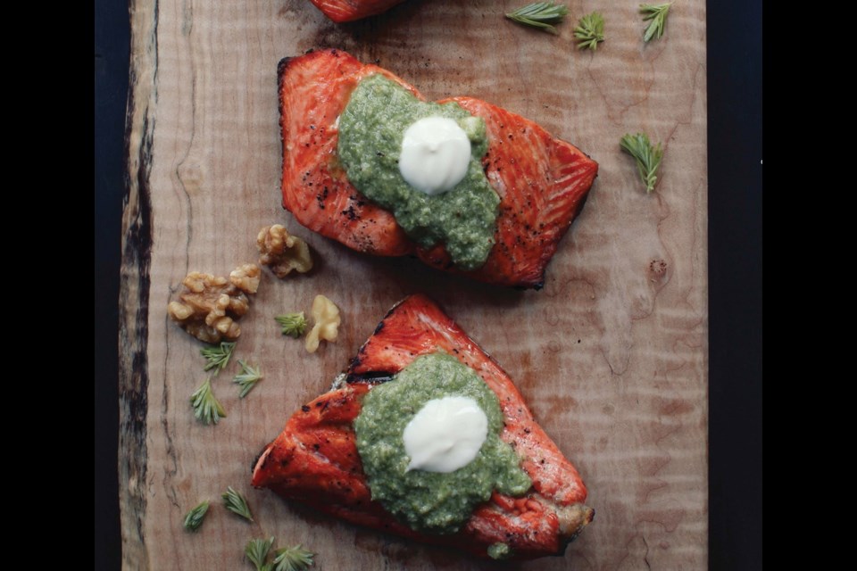 Wild salmon is grilled and topped with a tree tip pesto in this recipe from Feast: Recipes & Stories From A Canadian Road Trip (Appetite by Random House, $35).