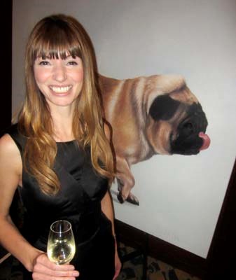 Before flying off to volunteer at Angkor Children's Hospital in Cambodia, RBC's Mary McPhail picked up Shannon Belkin's pug painting at the Taste the World benefit.