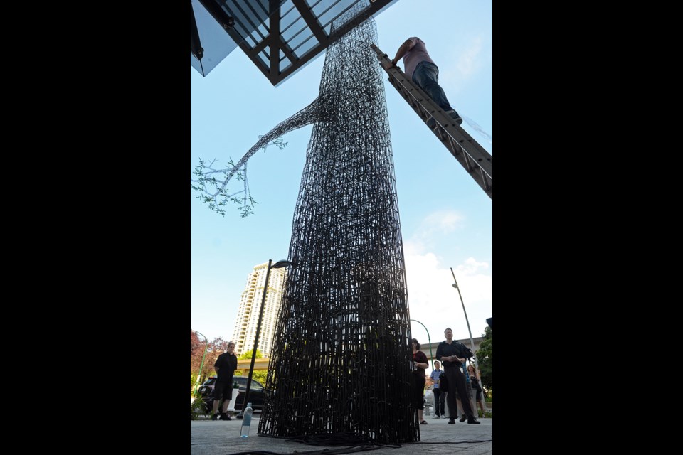 Old Column, a 25-foot metal sculpture in the shape of a Douglas fir tree, stands at the corner of Willingdon Avenue and Beresford Street.