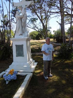 Tour guide Norman Soares stands at the Mother Marianne monument at Kalaupapa on the Hawaiian island of Molokai.